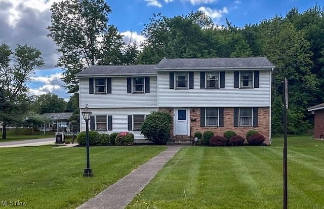 100 Chadwick Ln, Austintown, OH 44515 - colonial-style house with a front yard