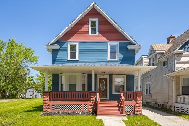 2205 W 85th St, Cleveland, OH 44102 - traditional style home with a porch and a front lawn