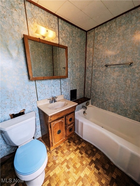 full bath with toilet, a bathtub, and vanity