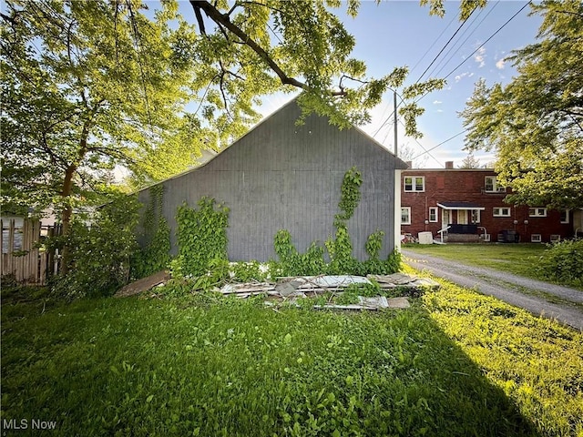716 N Charles St, Lima, OH 45805 - view of property exterior featuring a lawn