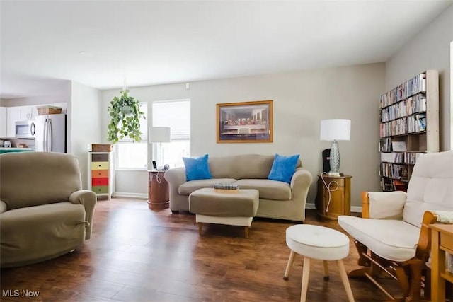 180 Elizabeth Pkwy, Akron, OH 44304 - living room with dark wood-style floors and baseboards