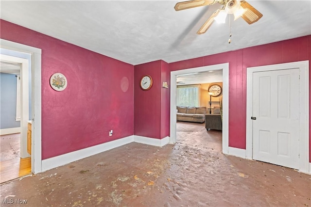 4723 Walnut St, Mantua, OH 44255 - empty room featuring baseboards and a ceiling fan