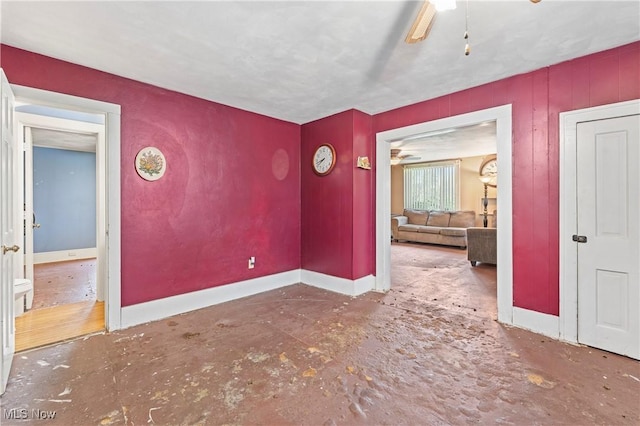 4723 Walnut St, Mantua, OH 44255 - empty room featuring a ceiling fan and baseboards
