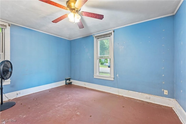 4723 Walnut St, Mantua, OH 44255 - spare room featuring baseboards, concrete floors, and a ceiling fan