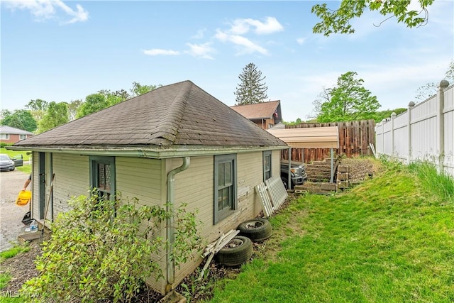 4723 Walnut St, Mantua, OH 44255 - view of home's exterior with roof with shingles