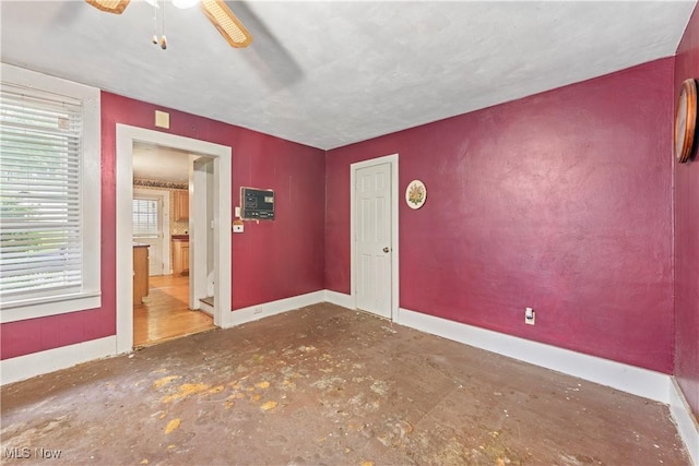 4723 Walnut St, Mantua, OH 44255 - unfurnished room featuring baseboards and ceiling fan
