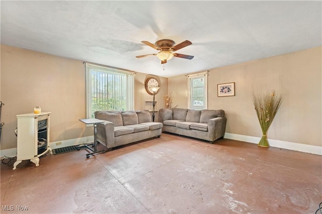 4723 Walnut St, Mantua, OH 44255 - living room featuring concrete floors, plenty of natural light, and a ceiling fan