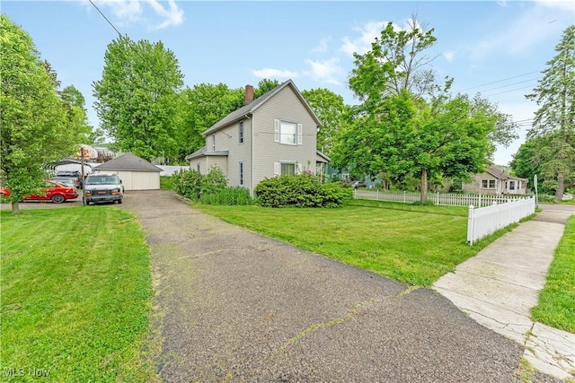 4723 Walnut St, Mantua, OH 44255 - view of home's exterior featuring a garage