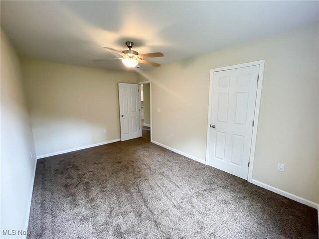 246 W Hamilton St, Oberlin, OH 44074 - unfurnished bedroom featuring carpet flooring, baseboards, and ceiling fan