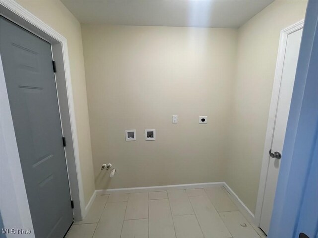246 W Hamilton St, Oberlin, OH 44074 - washroom with hookup for a washing machine, gas dryer hookup, hookup for an electric dryer, and baseboards