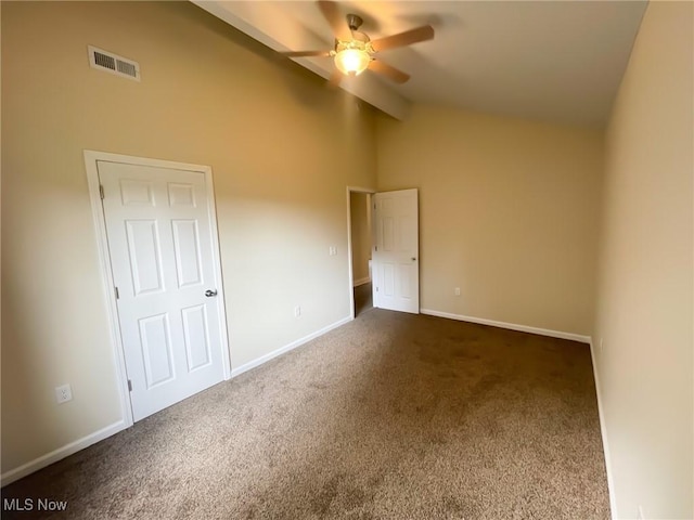 246 W Hamilton St, Oberlin, OH 44074 - unfurnished bedroom featuring dark colored carpet, baseboards, beam ceiling, high vaulted ceiling, and ceiling fan