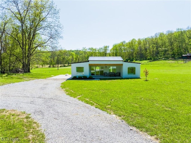 4043 Township Road 271, Killbuck, OH 44637 - view of front facade with gravel driveway and a front yard