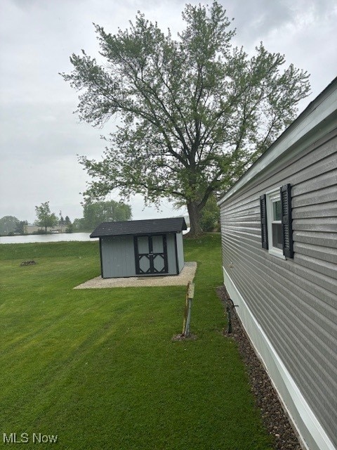 14 Carpenter Blvd, Marshallville, OH 44645 - view of green lawn featuring a water view