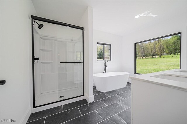 4059 Township Road 271, Killbuck, OH 44637 - bathroom with a shower stall, baseboards, and a soaking tub