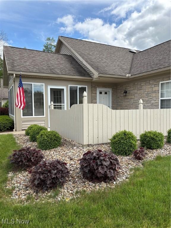 1932 S Lincoln Ave Unit 2, Salem, OH 44460 - view of property exterior featuring roof with shingles