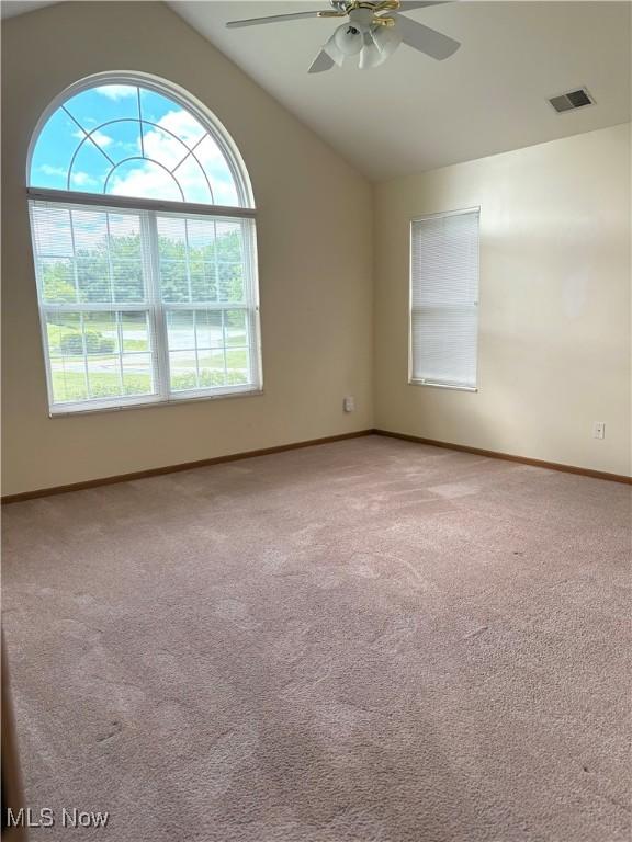 1932 S Lincoln Ave Unit 2, Salem, OH 44460 - unfurnished room with ceiling fan, vaulted ceiling, carpet floors, and baseboards