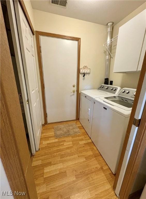 1932 S Lincoln Ave Unit 2, Salem, OH 44460 - laundry room featuring separate washer and dryer and light wood-style flooring