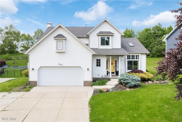 traditional-style house with an attached garage, a chimney, driveway, and a shingled roof