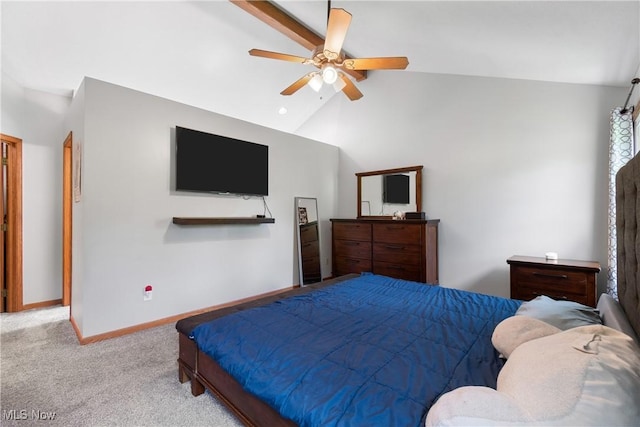 carpeted bedroom with lofted ceiling, baseboards, and ceiling fan