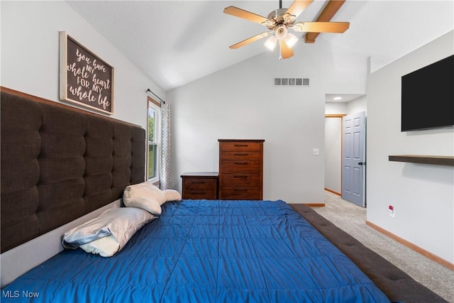 carpeted bedroom featuring vaulted ceiling, baseboards, and a ceiling fan