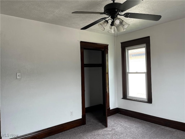3039 W St, Weirton, WV 26062 - unfurnished bedroom with carpet floors, baseboards, a textured ceiling, and ceiling fan