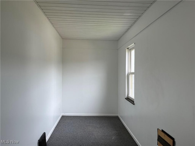 3039 W St, Weirton, WV 26062 - empty room featuring baseboards and dark colored carpet