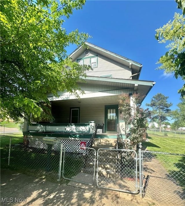 42 Colegate Dr, Marietta, OH 45750 - back of property featuring a porch and a gate