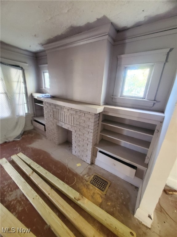 1239 E 143rd St, East Cleveland, OH 44112 - stairway featuring crown molding
