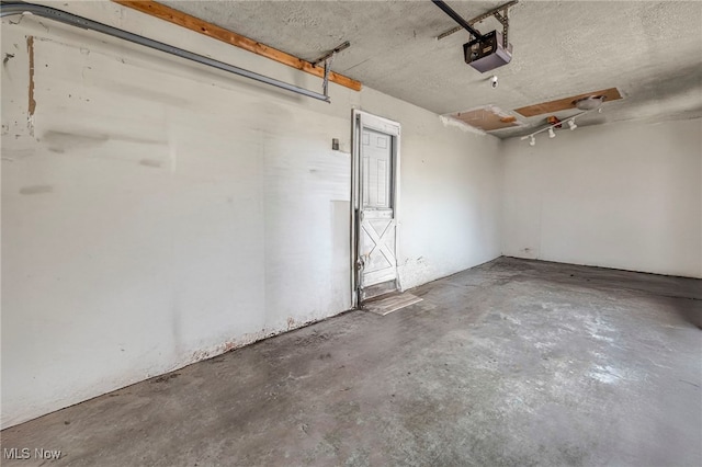 2212 Randall St, Lorain, OH 44052 - garage featuring a garage door opener