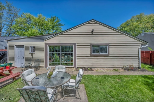 2212 Randall St, Lorain, OH 44052 - rear view of house with a patio