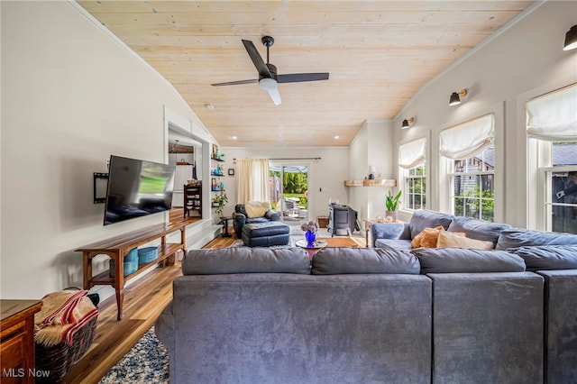 7214 Ridge Ave, Conneaut, OH 44030 - living room with wood ceiling, wood finished floors, a ceiling fan, crown molding, and vaulted ceiling