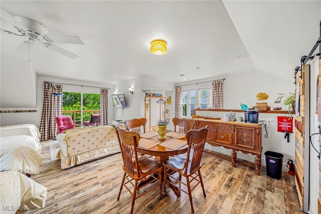 7214 Ridge Ave, Conneaut, OH 44030 - dining room with wood finished floors, plenty of natural light, ceiling fan, and lofted ceiling