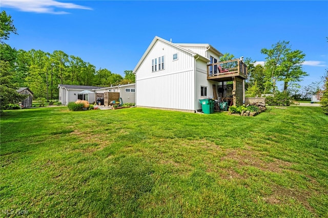 7214 Ridge Ave, Conneaut, OH 44030 - rear view of house with a wooden deck and a yard