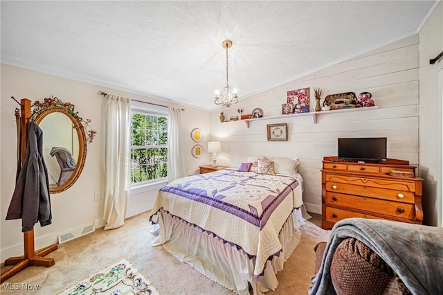 7214 Ridge Ave, Conneaut, OH 44030 - bedroom with lofted ceiling, a chandelier, carpet flooring, a textured ceiling, and baseboards