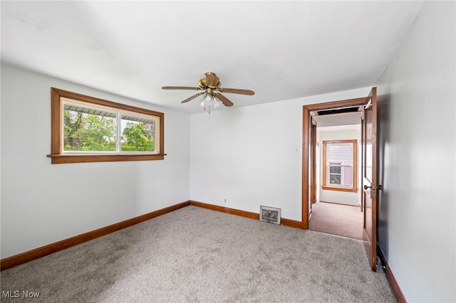 494 W Columbia St, Alliance, OH 44601 - carpeted spare room with a ceiling fan and baseboards