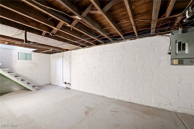 494 W Columbia St, Alliance, OH 44601 - unfinished basement featuring electric panel and stairs