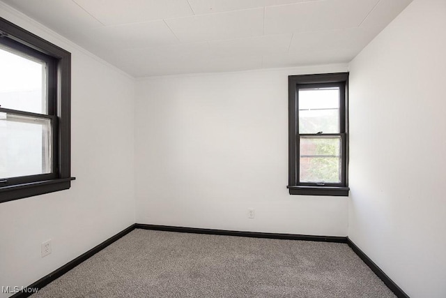 3615 Spokane Ave, Cleveland, OH 44109 - empty room featuring carpet and baseboards