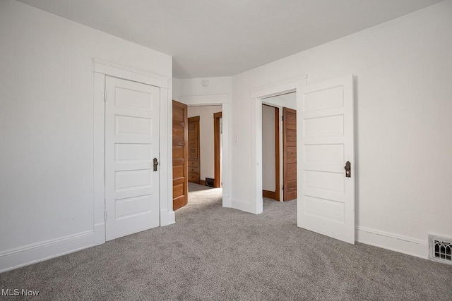 3615 Spokane Ave, Cleveland, OH 44109 - unfurnished bedroom with carpet and baseboards