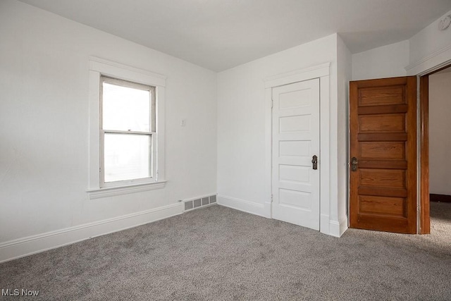 3615 Spokane Ave, Cleveland, OH 44109 - empty room featuring carpet flooring and baseboards