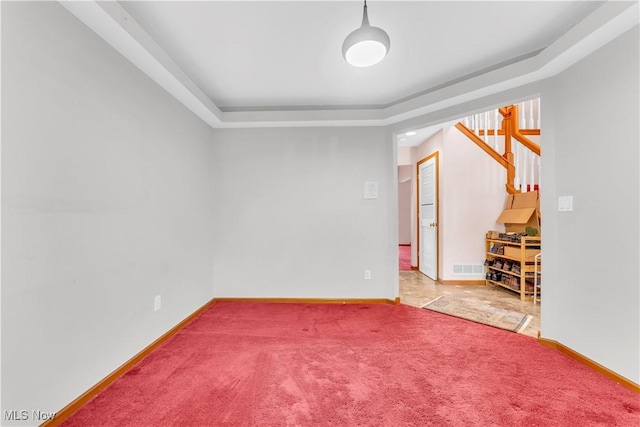 2736 Green Rd, Shaker Heights, OH 44122 - unfurnished room featuring carpet flooring, baseboards, and a raised ceiling