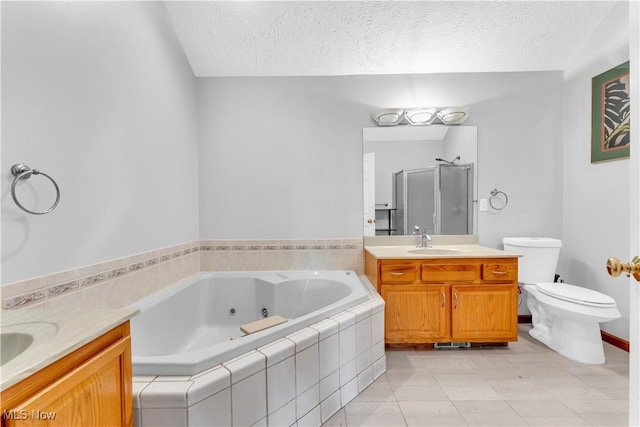 2736 Green Rd, Shaker Heights, OH 44122 - bathroom with a textured ceiling, a stall shower, vanity, a jetted tub, and toilet