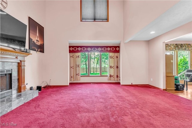 2736 Green Rd, Shaker Heights, OH 44122 - unfurnished living room with a fireplace, carpet, a high ceiling, and baseboards