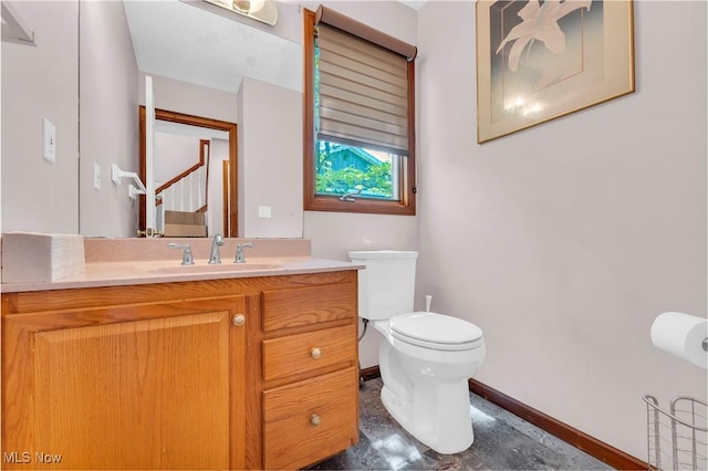 2736 Green Rd, Shaker Heights, OH 44122 - bathroom with baseboards, toilet, and vanity
