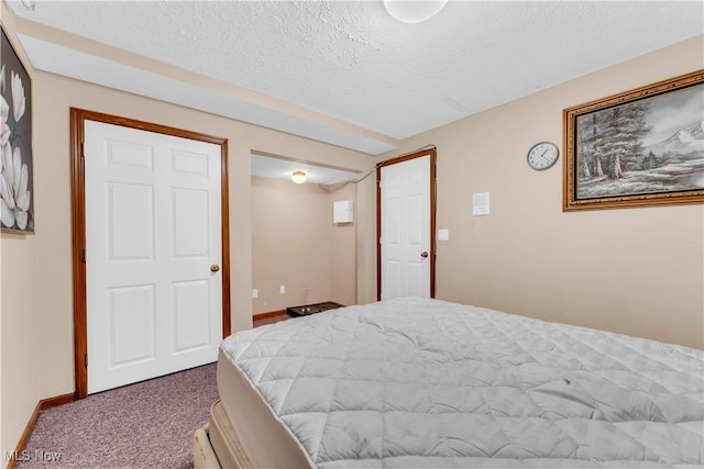 2736 Green Rd, Shaker Heights, OH 44122 - bedroom with carpet, a textured ceiling, and baseboards