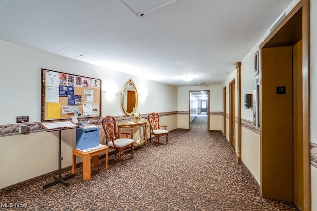 living area featuring carpet floors and elevator