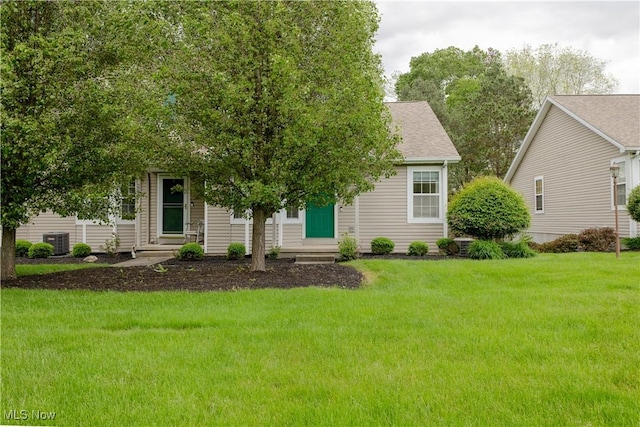 6957 Tippecanoe Rd, Canfield, OH 44406 - view of front of property with central AC unit, a front lawn, entry steps, and roof with shingles