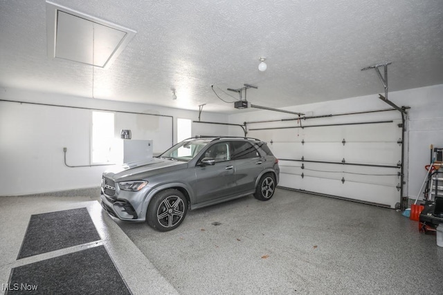 1367 Mockingbird Dr, Kent, OH 44240 - garage featuring a garage door opener