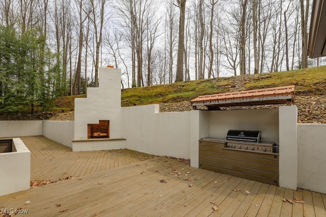 1367 Mockingbird Dr, Kent, OH 44240 - wooden terrace with an outdoor fireplace