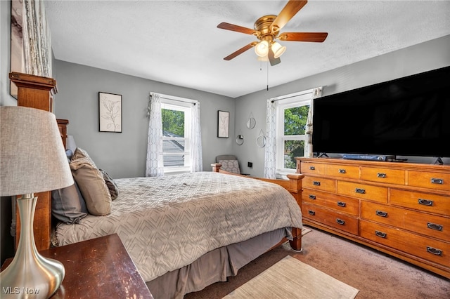 3403 Hartwood Rd, Cleveland Heights, OH 44112 - carpeted bedroom featuring a ceiling fan and a textured ceiling