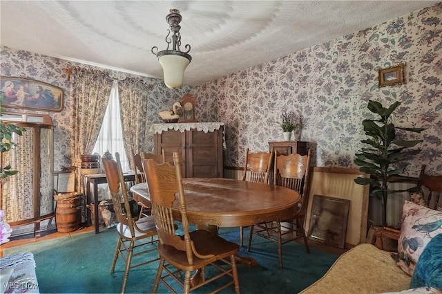 3277 Plainview Rd, Ravenna, OH 44266 - dining area with wallpapered walls and wainscoting
